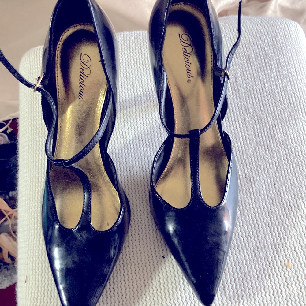 Black patent leather pumps, size 8.5